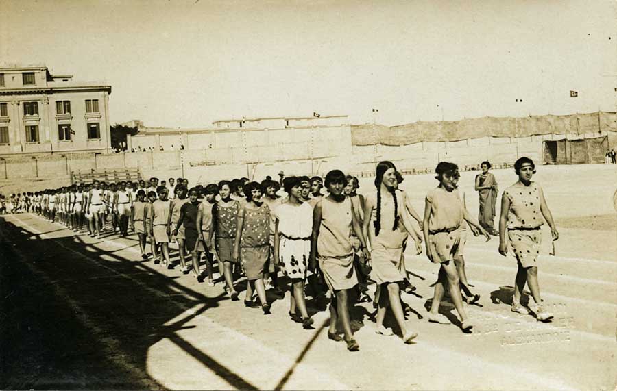 Female athletes march ahead of their male counterparts at the opening ceremony in Alexandria, Egypt. Norbert Schiller Collection Phot. Sellian