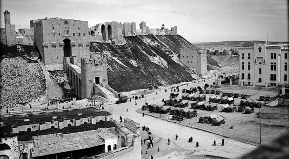 Photograph taken from the minaret of Al-Khosrofieh mosque looking northeast towards the entrance to Citadel in Aleppo. Circa 1930s