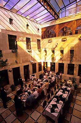Patrons at Dar Zamaria having lunch in the central courtyard Ph. Norbert Schiller